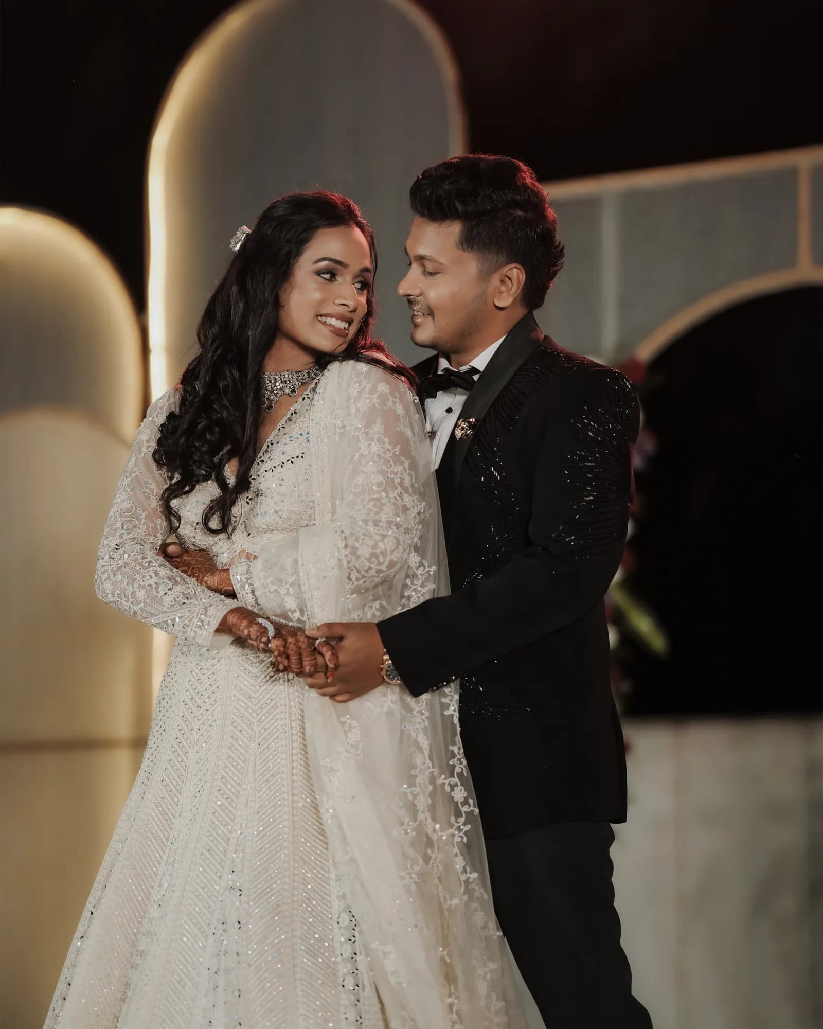 A couple dressed for the sangeet — Darshan Ravi Photography